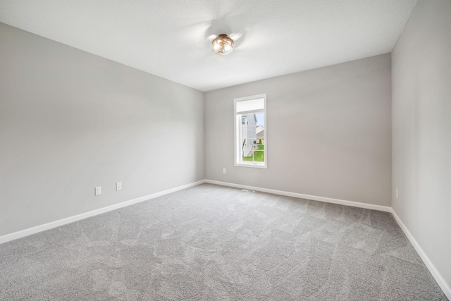 14645 Cloquet St, Dayton, MN 55327 - unfurnished room featuring baseboards and carpet flooring