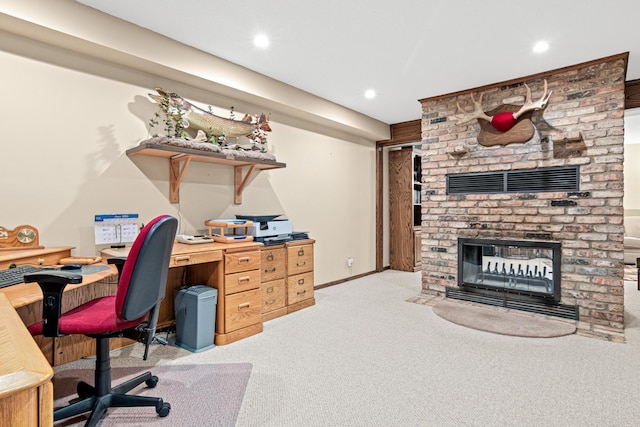 17000 Jackal St NW, Ramsey, MN 55303 - home office with light colored carpet, a fireplace, and recessed lighting