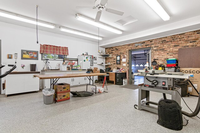 17000 Jackal St NW, Ramsey, MN 55303 - misc room featuring a workshop area, brick wall, and ceiling fan