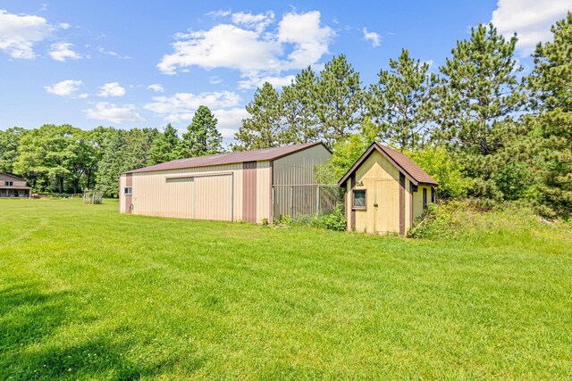 17000 Jackal St NW, Ramsey, MN 55303 - view of green lawn featuring an outbuilding and an outdoor structure
