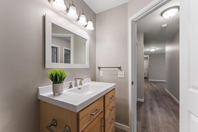 6333 Alderwood Cir Unit D, Woodbury, MN 55125 - bathroom with wood finished floors and vanity