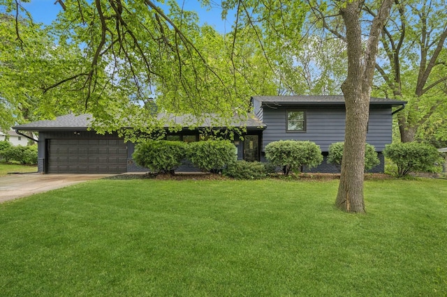 2500 Ensign Ave N, Golden Valley, MN 55427 - split level home featuring an attached garage, a front yard, and concrete driveway