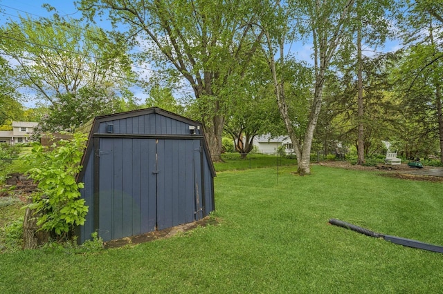 2500 Ensign Ave N, Golden Valley, MN 55427 - view of grassy yard with a shed