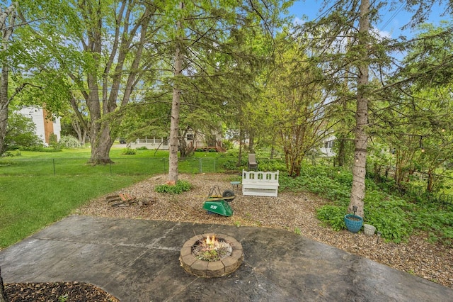 2500 Ensign Ave N, Golden Valley, MN 55427 - view of yard featuring an outdoor fire pit and a patio area