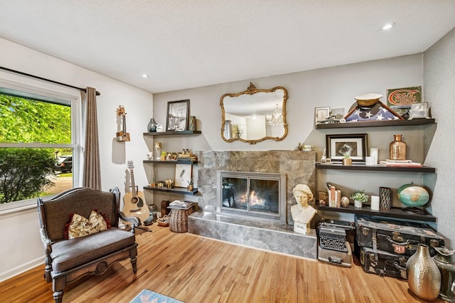 2500 Ensign Ave N, Golden Valley, MN 55427 - living room featuring wood finished floors, a fireplace, and recessed lighting