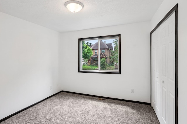 933 Beech St, Saint Paul, MN 55106 - unfurnished bedroom with carpet and a closet