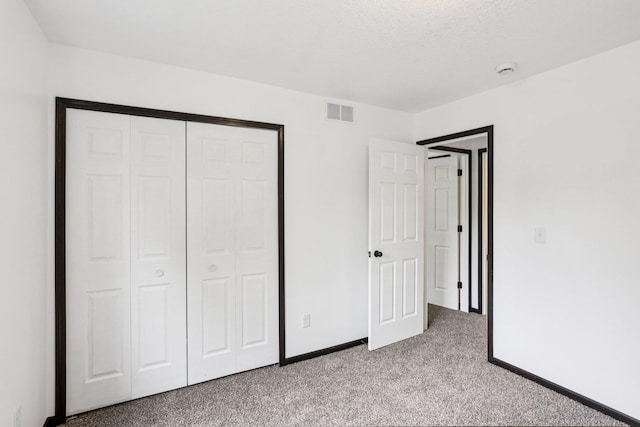 933 Beech St, Saint Paul, MN 55106 - unfurnished bedroom with light colored carpet and a closet
