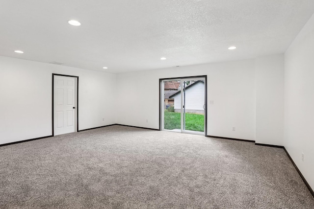 933 Beech St, Saint Paul, MN 55106 - unfurnished room featuring recessed lighting, carpet flooring, and a textured ceiling