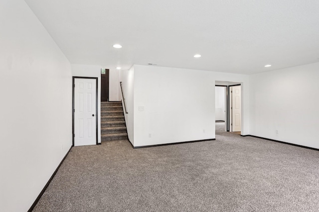 933 Beech St, Saint Paul, MN 55106 - unfurnished room with carpet floors, recessed lighting, and stairs