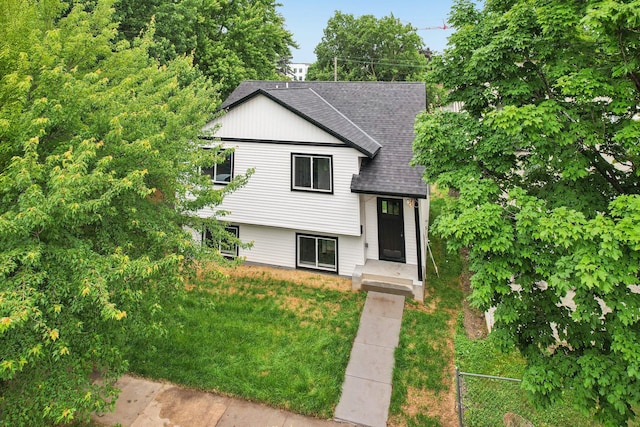 933 Beech St, Saint Paul, MN 55106 - view of front of house featuring roof with shingles