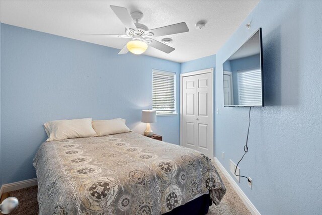 1702 Lakeshore Dr Unit 3, Lake City, MN 55041 - carpeted bedroom featuring a closet and a ceiling fan