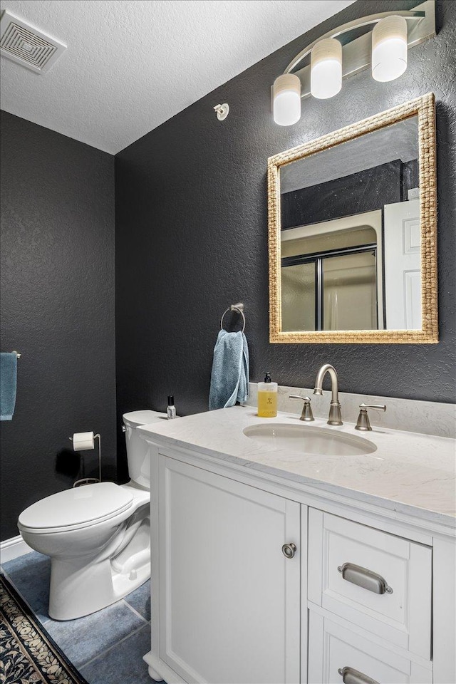 1702 Lakeshore Dr Unit 3, Lake City, MN 55041 - bathroom with vanity, a textured wall, a textured ceiling, and tile patterned floors
