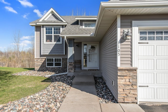 1105 Pioneer Trl SE, Cambridge, MN 55008 - property entrance featuring a shingled roof and stone siding