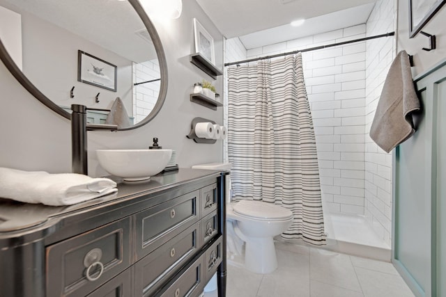 1105 Pioneer Trl SE, Cambridge, MN 55008 - full bath featuring vanity, tile patterned flooring, and a tile shower