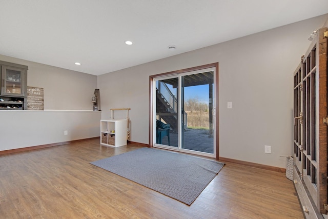 1105 Pioneer Trl SE, Cambridge, MN 55008 - spare room featuring wood finished floors and recessed lighting