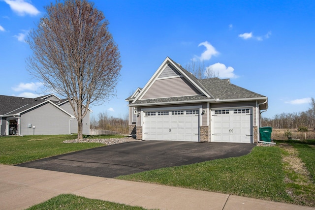 1105 Pioneer Trl SE, Cambridge, MN 55008 - garage featuring asphalt driveway
