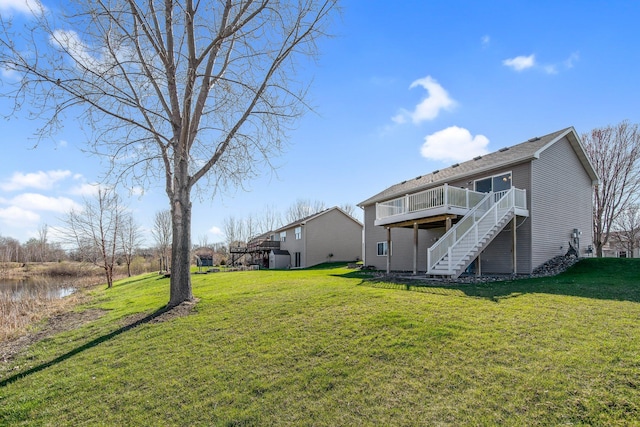 1105 Pioneer Trl SE, Cambridge, MN 55008 - view of grassy yard with stairs and a wooden deck