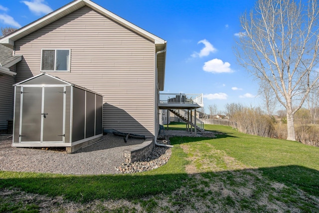 1105 Pioneer Trl SE, Cambridge, MN 55008 - view of home's exterior featuring stairway, a yard, and a wooden deck