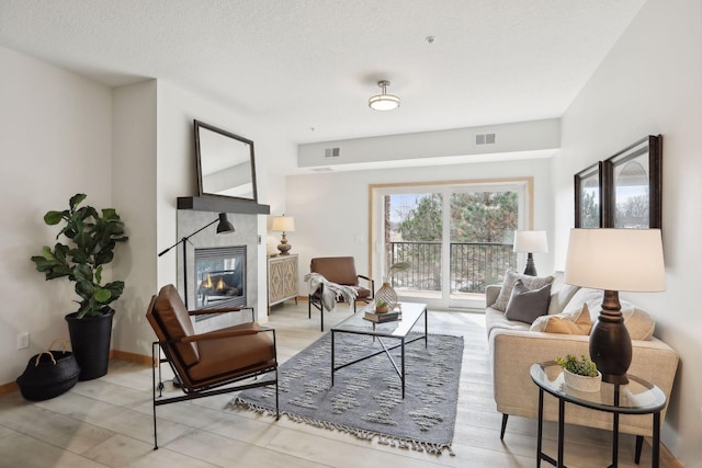 10806 Shore Dr Unit 103, Plymouth, MN 55441 - living room featuring a tiled fireplace
