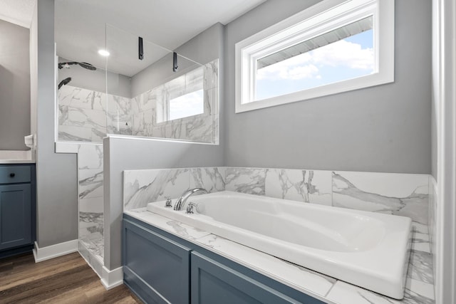 1401 142nd Ct E, Rosemount, MN 55068 - bathroom with a bath, a marble finish shower, and wood finished floors