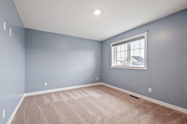 1401 142nd Ct E, Rosemount, MN 55068 - carpeted spare room featuring baseboards
