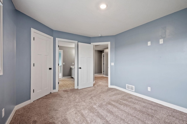 1401 142nd Ct E, Rosemount, MN 55068 - unfurnished bedroom featuring light colored carpet and baseboards