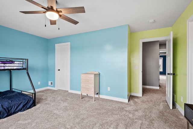 1401 142nd Ct E, Rosemount, MN 55068 - unfurnished bedroom with carpet floors, baseboards, and ceiling fan