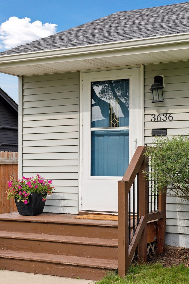 3636 Sumter Ave S, Saint Louis Park, MN 55426 - doorway to property featuring roof with shingles