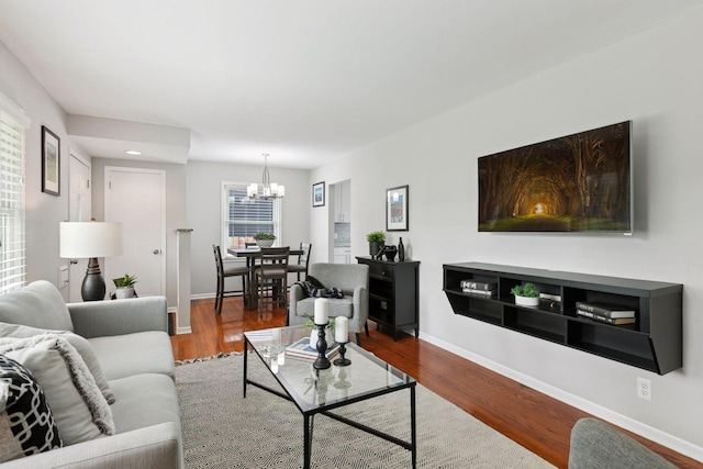 3636 Sumter Ave S, Saint Louis Park, MN 55426 - living room featuring a chandelier and wood finished floors