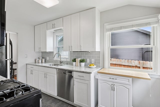 3636 Sumter Ave S, Saint Louis Park, MN 55426 - kitchen with dishwasher, black range with gas stovetop, healthy amount of natural light, and white cabinetry
