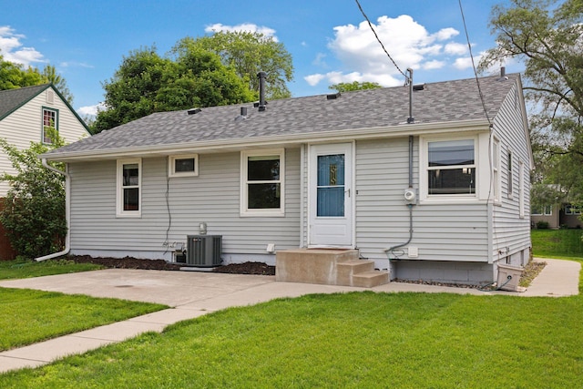 3636 Sumter Ave S, Saint Louis Park, MN 55426 - back of house featuring a lawn and roof with shingles
