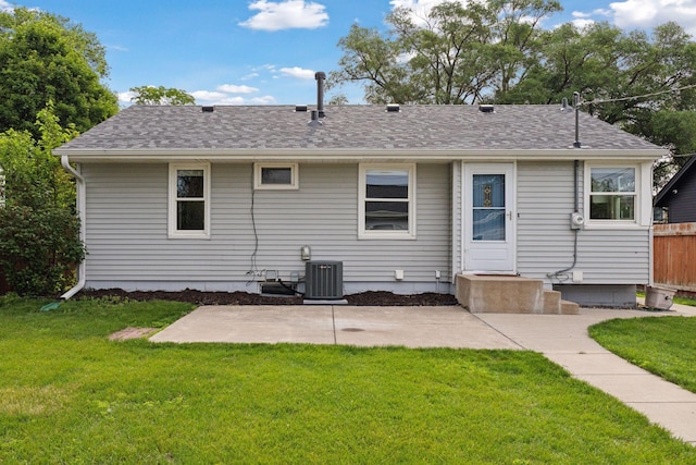 3636 Sumter Ave S, Saint Louis Park, MN 55426 - back of property featuring a patio area and roof with shingles