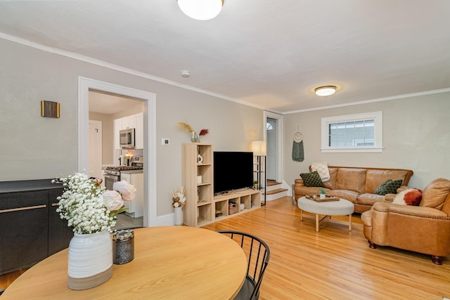 1848 James Ave, Saint Paul, MN 55105 - living area featuring ornamental molding and light wood-style flooring