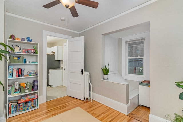 1848 James Ave, Saint Paul, MN 55105 - interior space with light wood-style floors, a ceiling fan, and ornamental molding