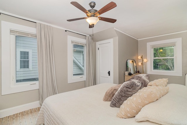 1848 James Ave, Saint Paul, MN 55105 - bedroom with crown molding, wood finished floors, and ceiling fan