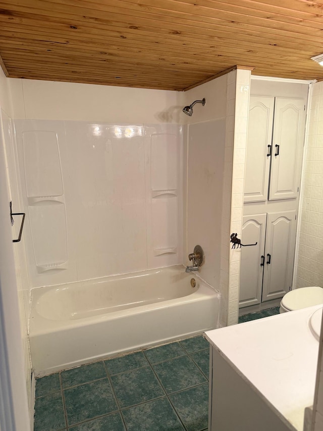 110 9th Ave NE, Deer River, MN 56636 - bathroom featuring wooden ceiling, tile patterned flooring,  shower combination, vanity, and toilet