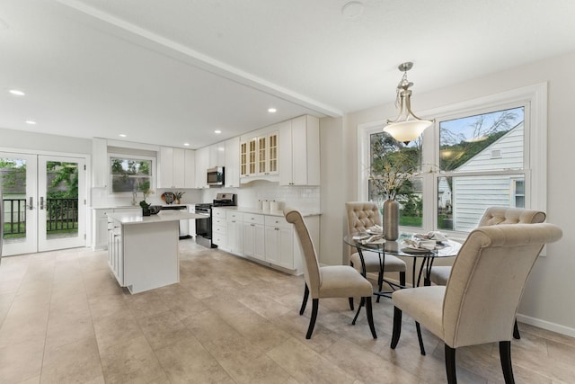 1032 Scheffer Ave, Saint Paul, MN 55102 - dining space featuring french doors and recessed lighting