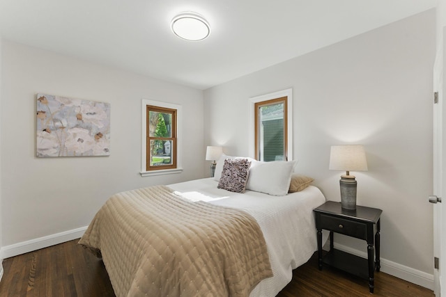 1032 Scheffer Ave, Saint Paul, MN 55102 - bedroom with baseboards and dark wood finished floors