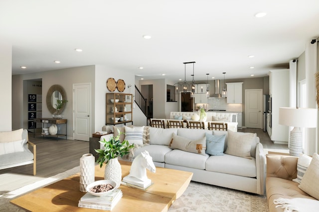19648 104th Pl, Corcoran, MN 55374 - living area with stairway, light wood-style floors, and recessed lighting