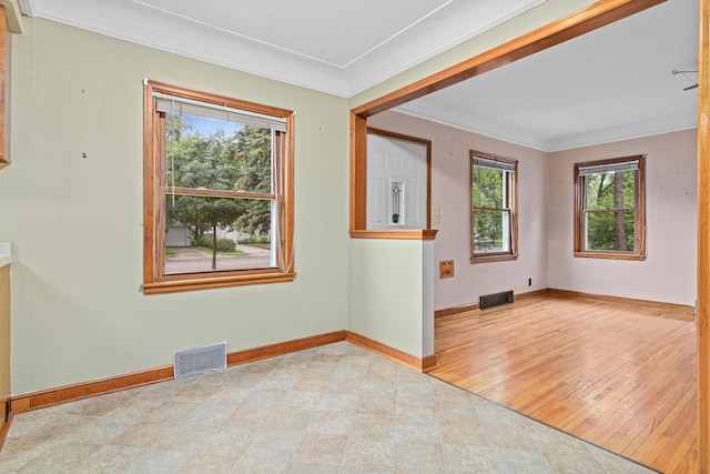 148 5th Ave N, Hopkins, MN 55343 - unfurnished room with crown molding and baseboards