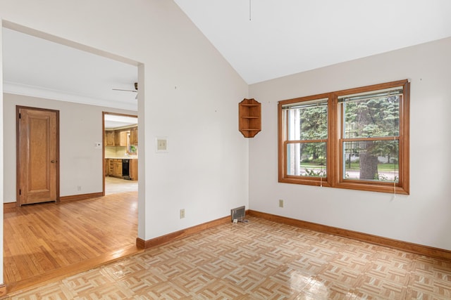 148 5th Ave N, Hopkins, MN 55343 - spare room featuring a ceiling fan, lofted ceiling, and parquet flooring