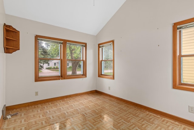 148 5th Ave N, Hopkins, MN 55343 - unfurnished room featuring baseboards and high vaulted ceiling