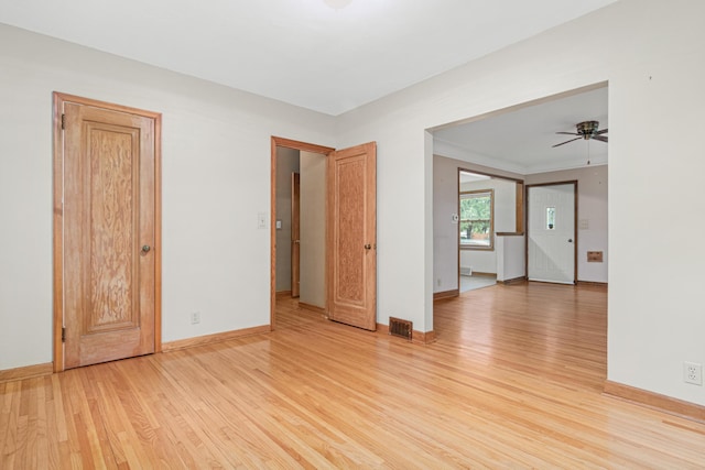 148 5th Ave N, Hopkins, MN 55343 - unfurnished room with light wood-style flooring and ceiling fan