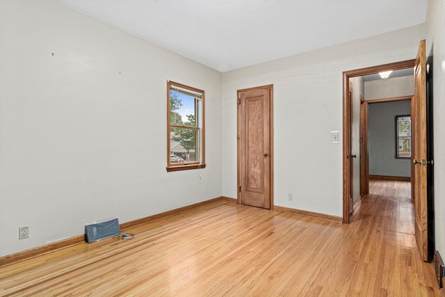 148 5th Ave N, Hopkins, MN 55343 - empty room with light wood-type flooring and baseboards