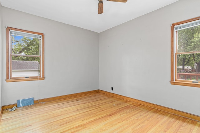 148 5th Ave N, Hopkins, MN 55343 - unfurnished room featuring wood finished floors and ceiling fan