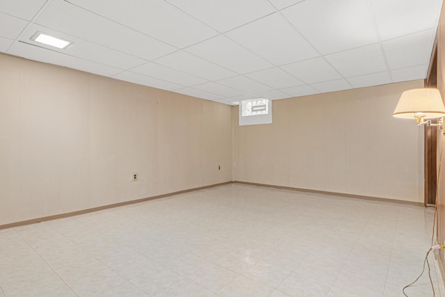 148 5th Ave N, Hopkins, MN 55343 - basement with a paneled ceiling and light flooring