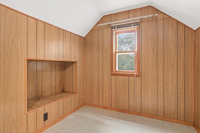 148 5th Ave N, Hopkins, MN 55343 - bonus room featuring vaulted ceiling, wooden walls, and tile patterned floors