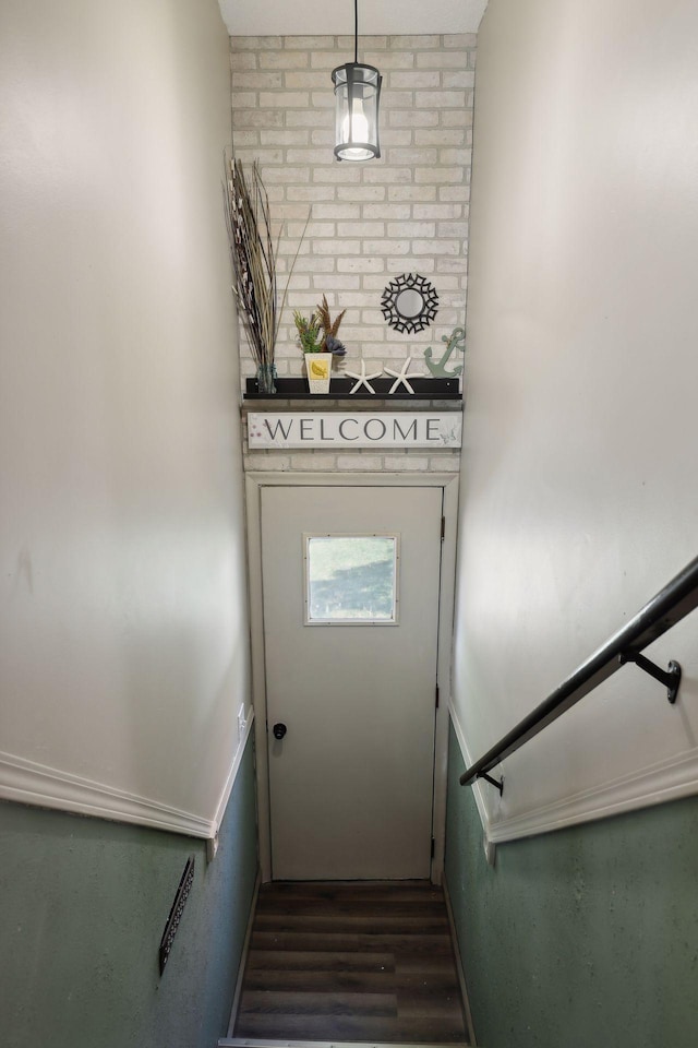 1060 Greer Ave NW, Albion Twp, MN 55358 - stairway featuring wood finished floors