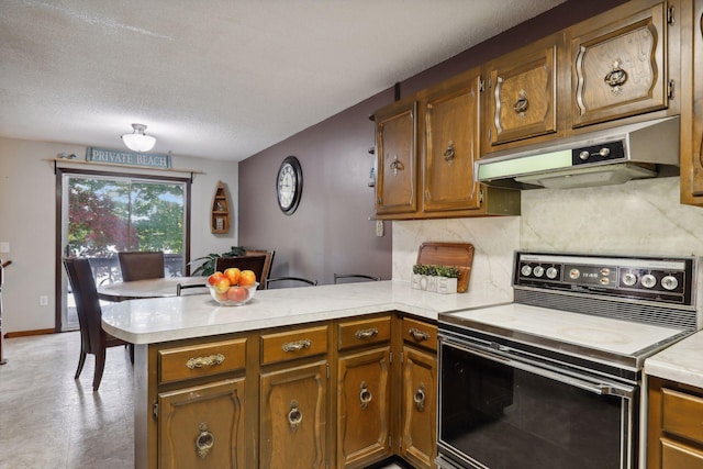 1060 Greer Ave NW, Albion Twp, MN 55358 - kitchen featuring electric stove, extractor fan, a peninsula, light countertops, and a textured ceiling