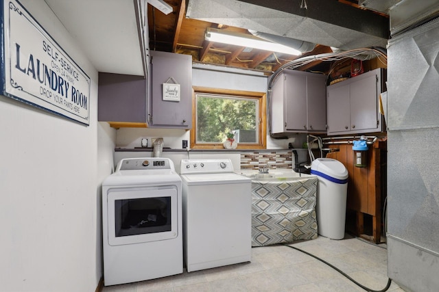 1060 Greer Ave NW, Albion Twp, MN 55358 - washroom featuring cabinet space and washer and dryer